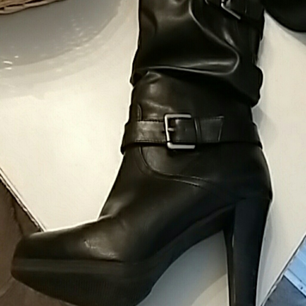 Women's black heeled boots slip on black with buckles on the side